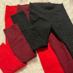 Bundle of 3 Cat & Jack 4T black sparkle, burgundy sparky and red leggings